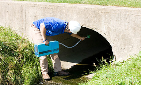 Field Technician Monitoring Mercury in Culvert Using the RA-915M Mercury Analyzer