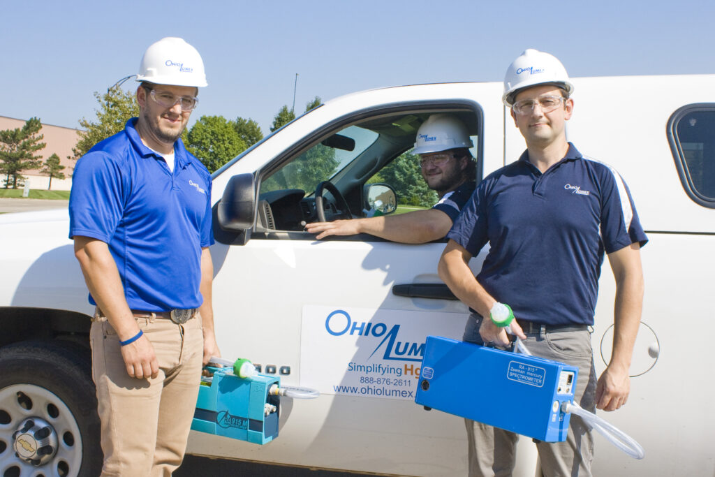 Group standing around an Ohio Lumex truck